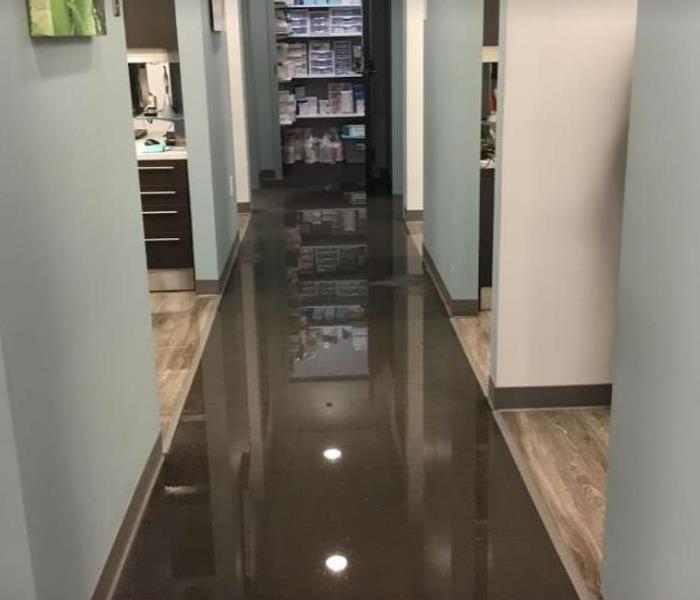 standing water in hallway of dentist office