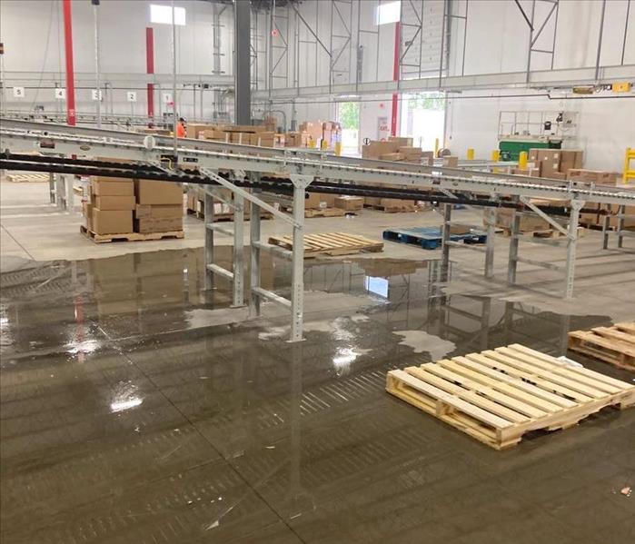 water on warehouse floor