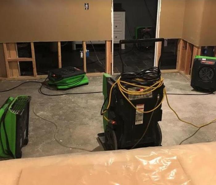 drywall and flooring removed and equipment set