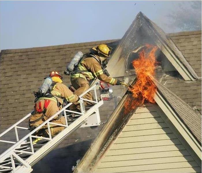 firefighters putting out fire